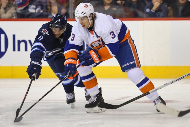 Travis Hamonic against the Winnipeg Jets