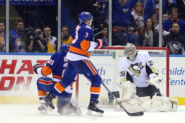 Kyle Okposo and Travis Hamonic