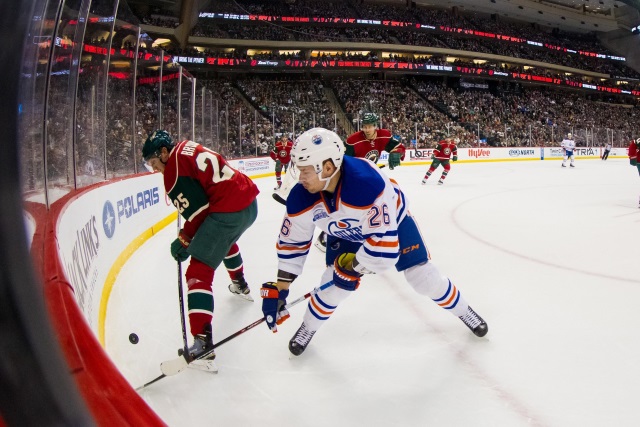 Jonas Brodin of the Minnesota Wild and Iiro Pakarinen of the Edmonton Oilers