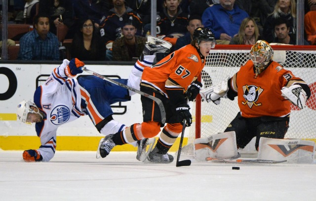 Frederik Andersen and Rickard Rakell of the Anaheim Ducks