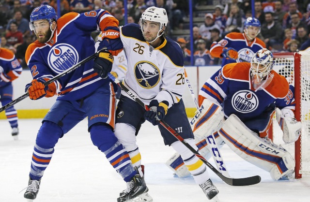 Matt Moulson of the Buffalo taking on the Edmonton Oilers