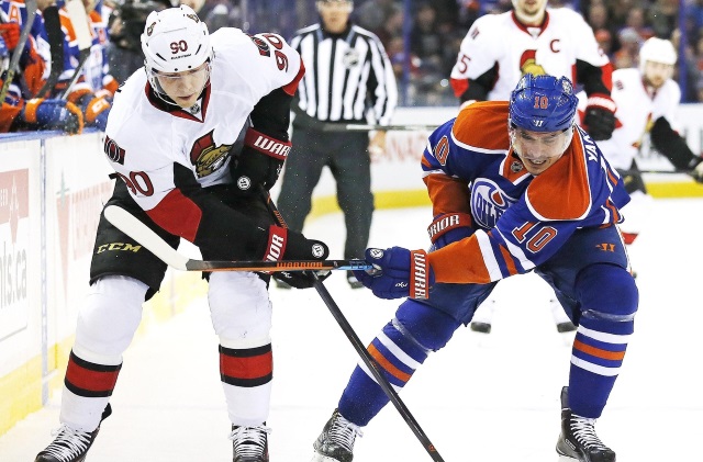 Nail Yakupov of the Edmonton Oilers and Alex Chiasson of the Ottawa Senators