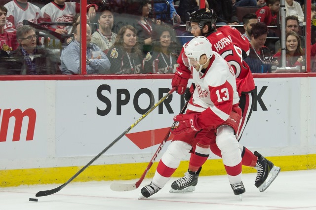 Mike Hoffman of the Ottawa Senators and Pavel Datsyuk of the Detroit Red Wings