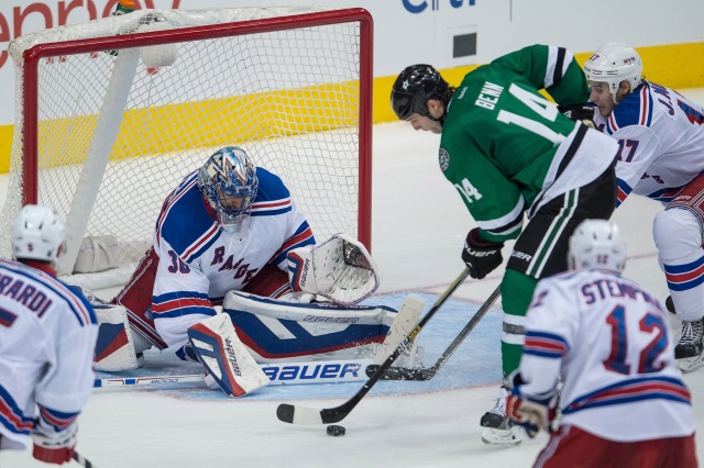 Jamie Benn of the Dallas Stars and Henrik Lundqvist of the New York Rangers