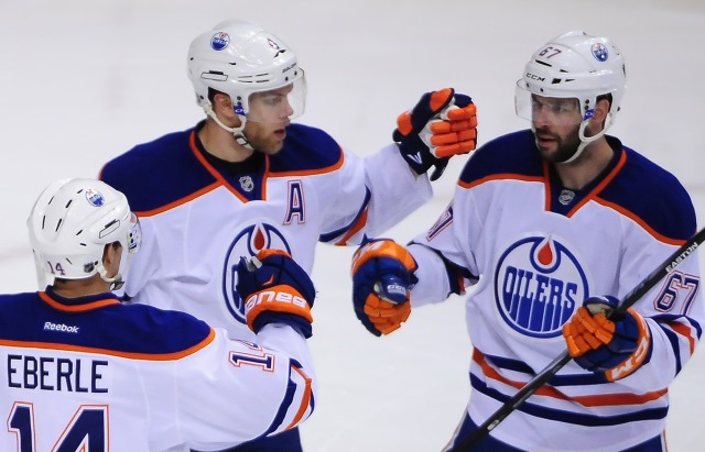 Jordan Eberle, Taylor Hall and Benoit Pouliot