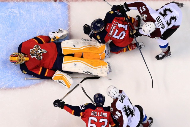 Brian Campbell, Dave Bolland and Roberto Luongo of the Florida Panthers