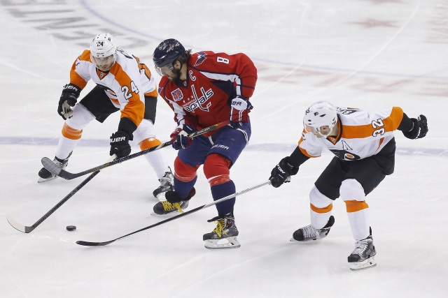 Matt Read and Mark Streit of the Philadephia Flyers