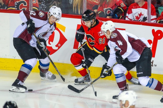 Tyson Barrie and Gabriel Landeskog of the Colorado Avalanche