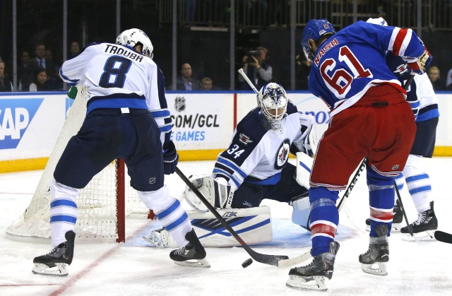 Jacob Trouba of the Winnipeg Jets and Rick Nash of the New York Rangers