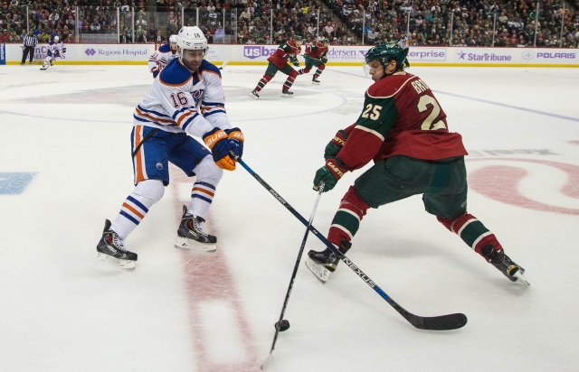 Jonas Brodin of the Minnesota and Teddy Purcell of the Edmonton Oilers