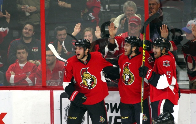 Mike Hoffman and Cody Ceci of the Ottawa Senators