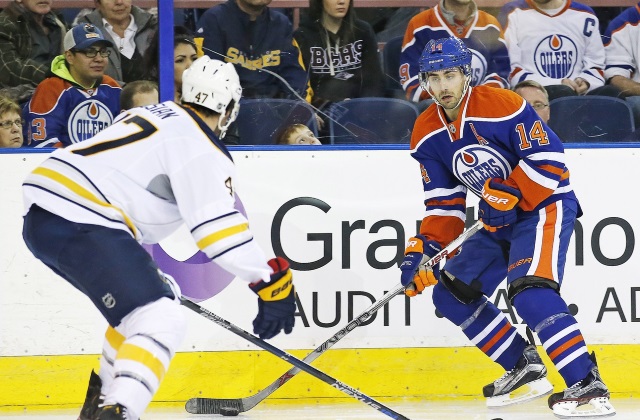 Zach Bogosian of the Buffalo Sabres and Jordan Eberle of the Edmonton Oilers