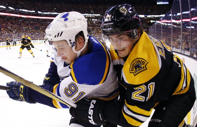 Loui Eriksson of the Boston Bruins and Vladimir Tarasenko of the St. Louis Blues