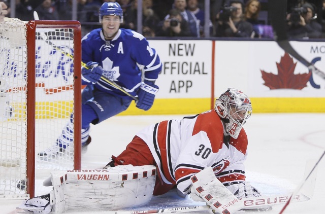 Cam Ward of the Carolina Hurricanes and P.A. Paranteau of the Toronto Maple Leafs