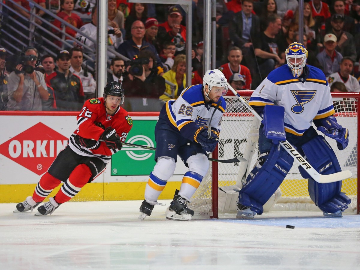 Artemi Panarin of the Chicago Blackhawks and Kevin Shattenkirk of the St. Louis Blues