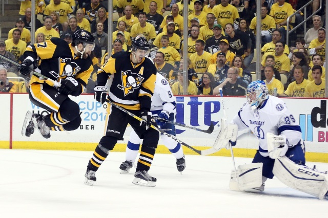 Evgeni Malkin of the Pittsburgh Penguins and Ben Bishop of the Tampa Bay Lightning