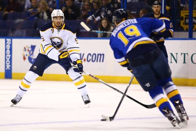 Evander Kane of the Buffalo Sabres and Jay Bouwmeester of the St. Louis Blues