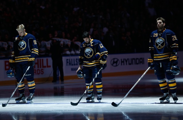 Rasmus Ristolainen and Zemgus Girgensons of the Buffalo Sabres