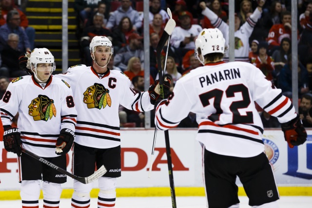 Artemi Panarin, Jonathan Toews and Patrick Kane of the Chicago Blackhawks