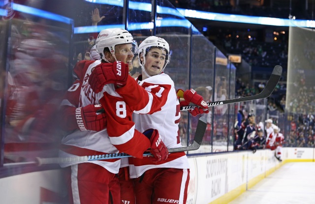 Dylan Larkin and Henrik Zetterberg of the Detroit Red Wings