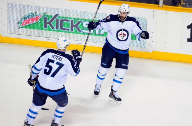 Tyler Myers and Drew Stafford