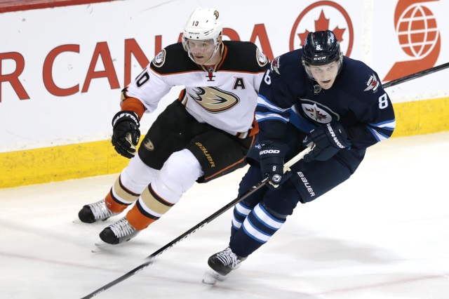 Corey Perry of the Anaheim Ducks and Jacob Trouba of the Winnipeg Jets