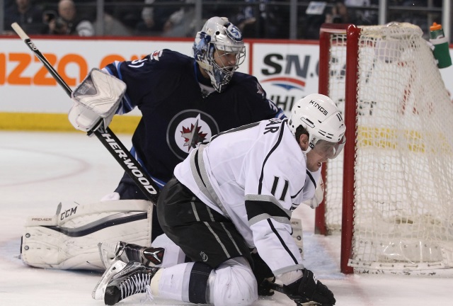 Ondrej Pavelec of the Winnipeg Jets and Anze Kopitar of the LA Kings