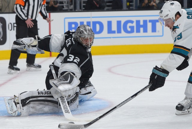 Jonathan Quick and Logan Couture