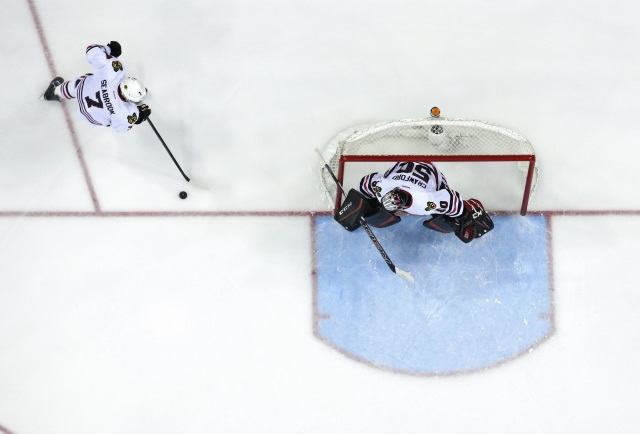 Brent Seabrook and Corey Crawford