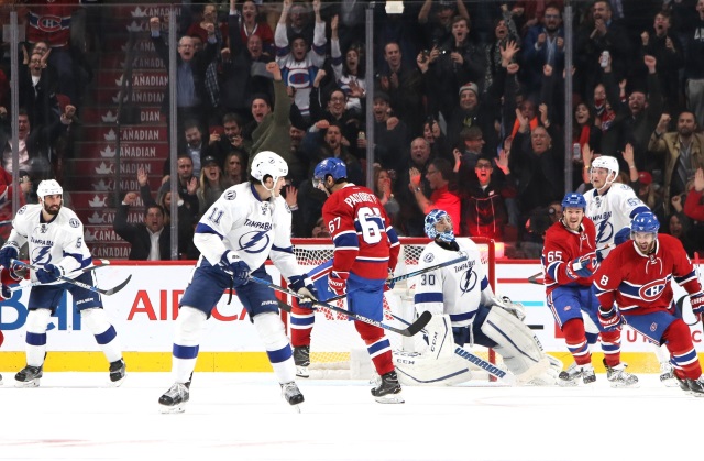 Max Pacioretty of the Montreal Canadiens and Ben Bishop of the Tampa Bay Lightning