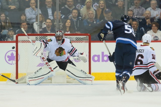 Corey Crawford and Mark Scheifele