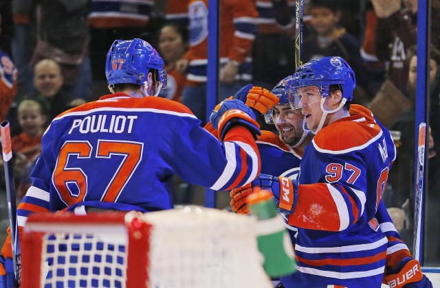 Jordan Eberle and Benoit Pouliot of the Edmonton Oilers