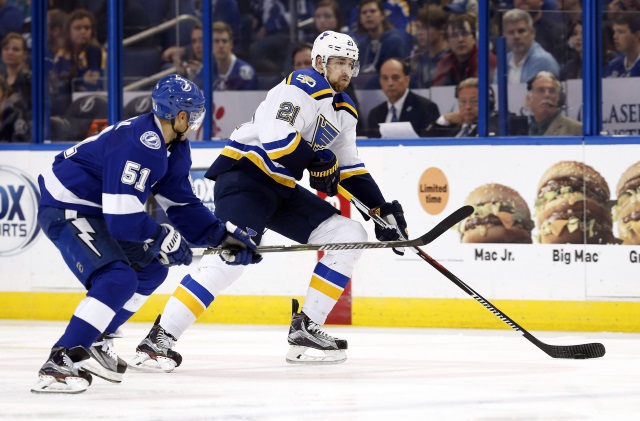 Valtteri Filppula of the Tampa Bay Lightning and Patrik Berglund of the St. Louis Blues