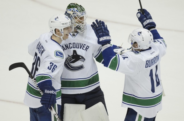 Jannik Hansen and Alex Burrows of the Vancouver Canucks