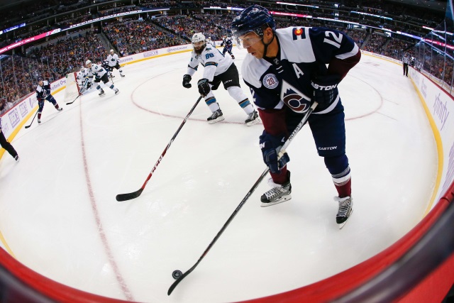 Jarome Iginla of the Colorado Avalanche and Brent Burns of the San Jose Sharks