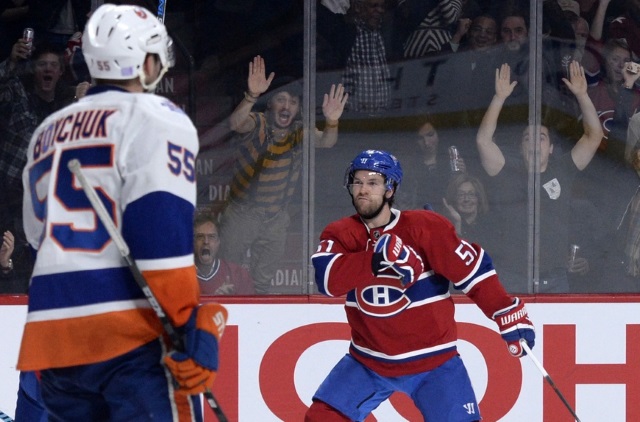 David Desharnais of the Montreal Canadiens and Johnny Boychuk of the New York Islanders