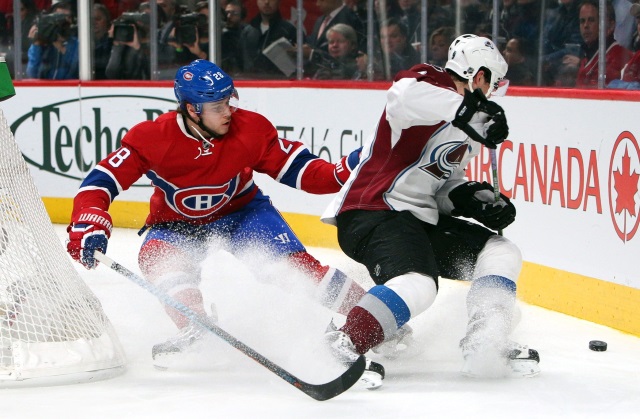 Matt Duchene of the Colorado Avalanche and Nathan Beaulieu of the Montreal Canadiens