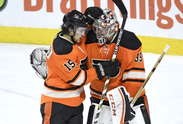 Michael Del Zotto and Steve Mason of the Philadelphia Flyers