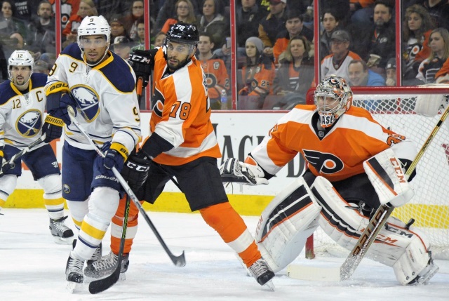 Evander Kane of the Buffalo Sabres and Steve Mason of the Philadelphia Flyers