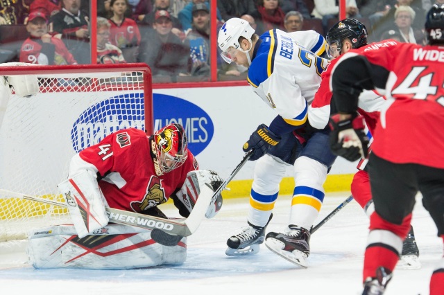 Patrik Berglund of the St. Louis Blues and Craig Anderson of the Ottawa Senators