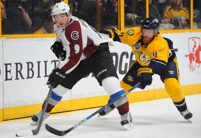 Matt Duchene of the Colorado Avalanche and Ryan Ellis of the Nashville Predators