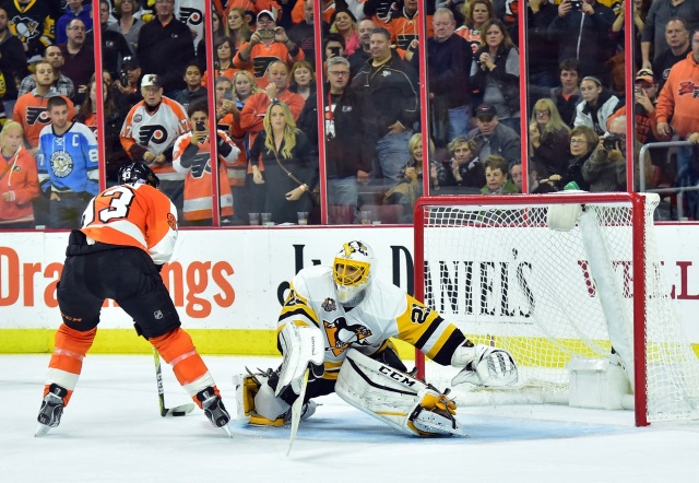 Marc-Andre Fleury of the Pittsburgh Penguins and Jakob Voracek of the Philadelphia Flyers