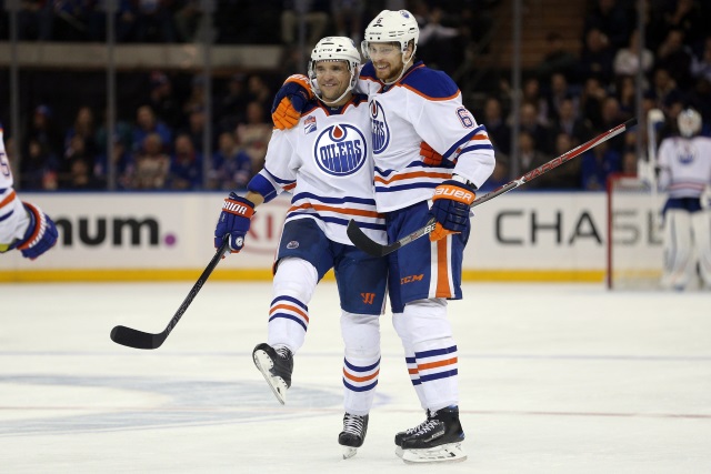 Andrej Sekera and Adam Larsson of the Edmonton Oilers