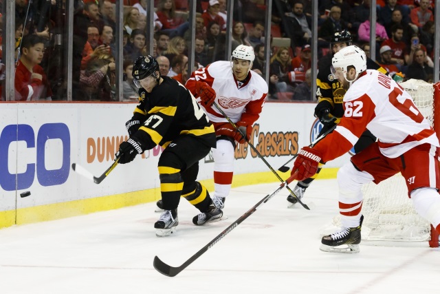 Andreas Athanasiou and Thomas Vanek of the Detroit Red Wings