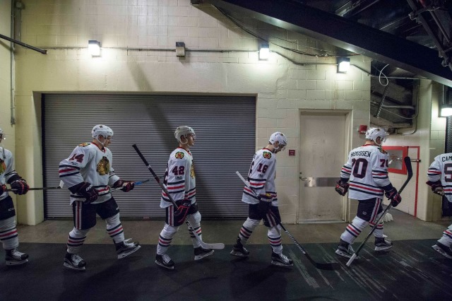 Marcus Kruger and Richard Panik of the Chicago Blackhawks