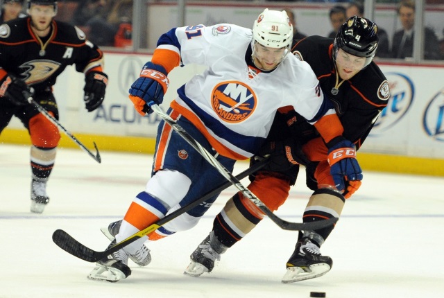 John Tavares of the New York Islanders and Cam Fowler of the Anaheim Ducks