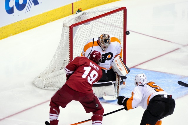 Shane Doan of the Arizona Coyotes and Steve Mason of the Philadelphia Flyers