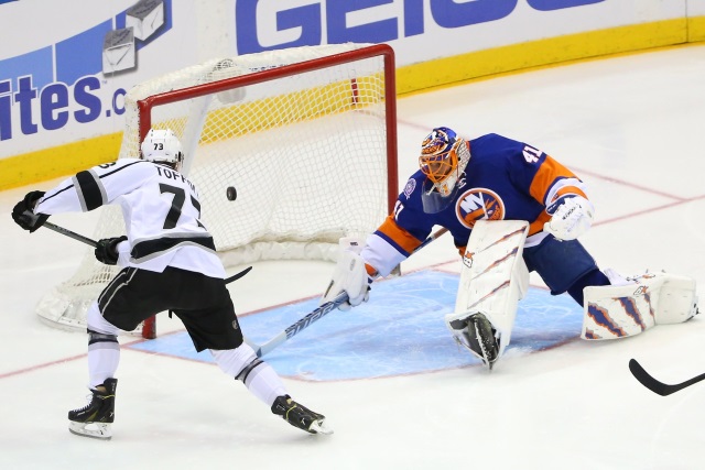 Tyler Toffoli of the Los Angeles Kings and Jaroslav Halak of the New York Islanders