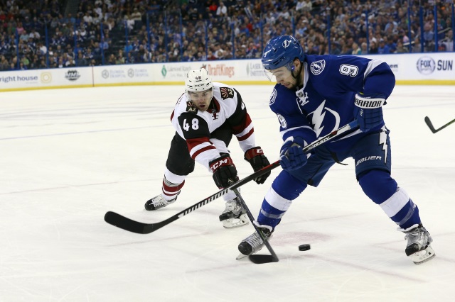 Tyler Johnson of the Tampa Bay Lightning and Jordan Martinook of the Arizona Coyotes