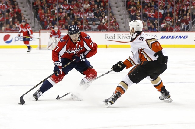 T.J. Oshie of the Washington Capitals and Clayton Stoner of the Anaheim Ducks